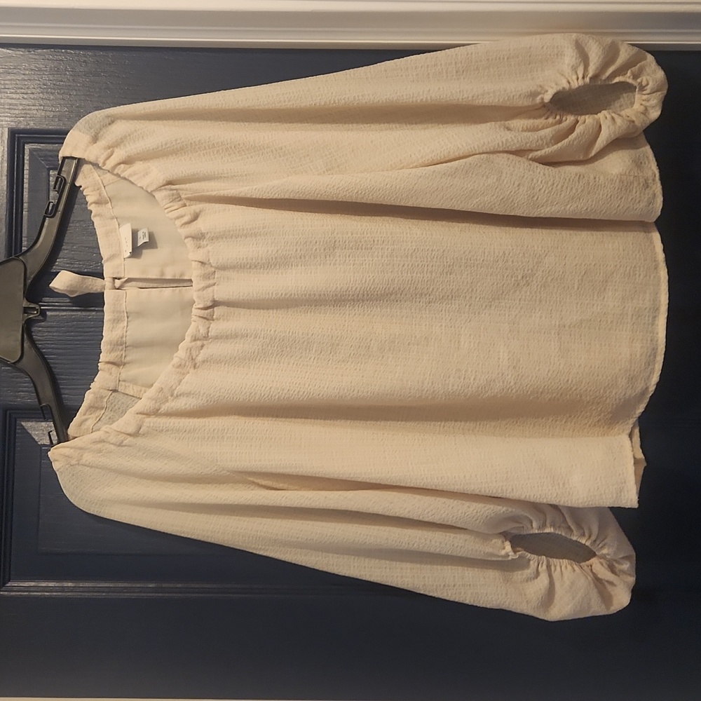 A New Day size, large cream blouse.